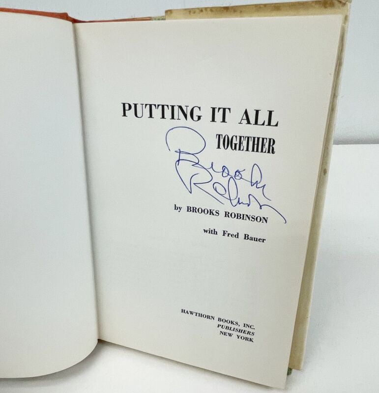 Brooks Robinson Signed Book (2 sigs) “Putting It All Together” w B&E Hologram