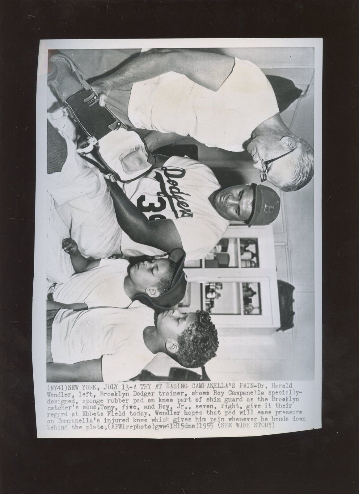 Original July 13 1955 Roy Campanella Brooklyn Dodgers Shin Guard Wire Photo