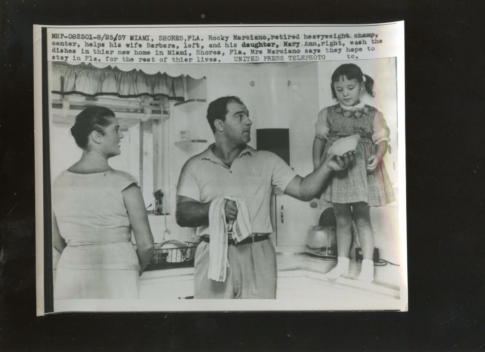 Original August 25 1957 Rocky Marciano & Wife & Daughter Boxing 7 X 9 Wire Photo